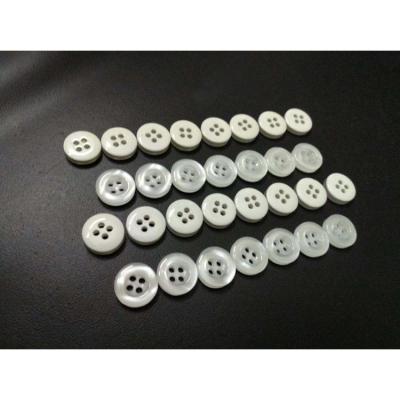 China 4 Hole Nickel Free Wholesale Pearl Buttons White Backside Plastic Sewing Buttons for sale