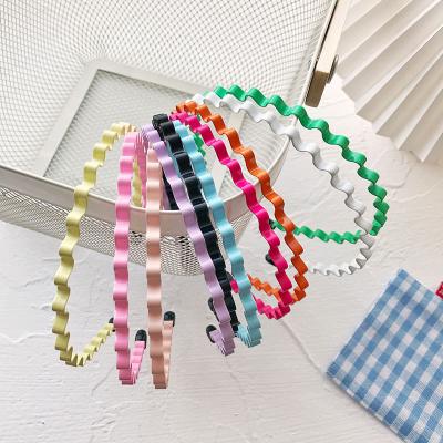 China Colorful Non-slip Washing Non-slip Thin Face Wave Circle Headband Metal Alloy Non Slip Fitness Headbands for sale