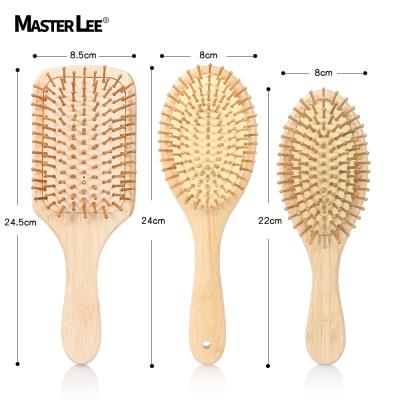 China Nondisposable in running popular logo bamboo custom paddle comb massager scalp brush detangling hair brush for women for sale