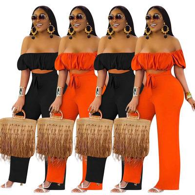 China 2021 New Summer Solid Color Breathable Women Short Sleeve One Shoulder Jumpsuit Sexy Ladies Wide Leg Pants Jumpsuit Women Rompers for sale