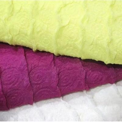 China Breathable Square bubble polyester spandex knitted clothing jacquard fabric for sale