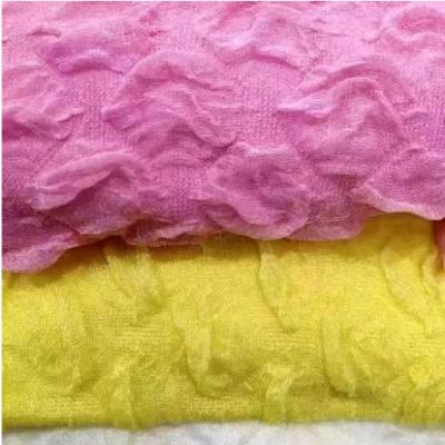 China Breathable Popular bubble polyester spandex knitted clothing jacquard fabric for sale