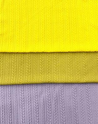 China Breathable Polyester single-sided jacquard fabric for popular clothing production for sale