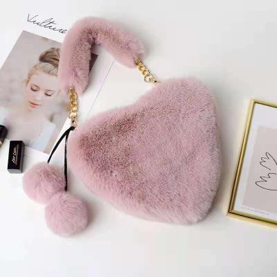 China 2021 fasion 2021 newest heart-shaped bag beautiful hairpin price cheap soft fluffy fur shoulder bag women's inclined bag girl's handbag for sale