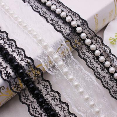 China Exquisite workable design width4cm black ribbon trim lace with beaded lace fabric trimming used for garments, bags, wedding dresses. for sale