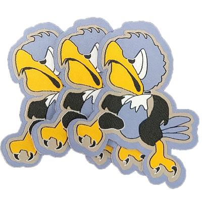 China Other Cartoon Woven Patch Custom Bird Embroidered Woven Patch For Garment Customizable Crow Woven Patches for sale