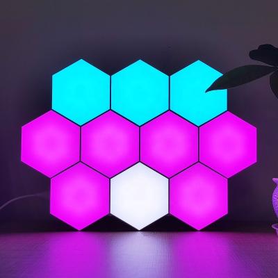 China DIY Smart Home Lights App Controlled RGB Color Changing USB Ambient Hexagon Wall Lamp Quantum Honeycomb Led Panels With Remote for sale