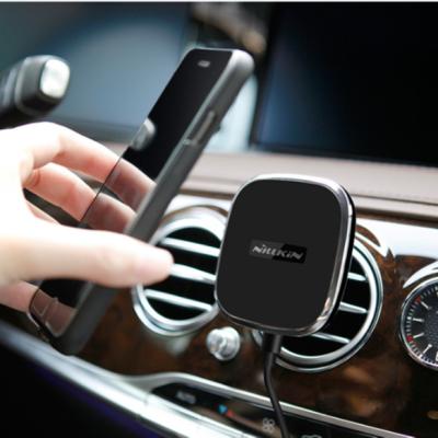 China Nillkin Carbon fiber car hoder Qi standard adjustable USB car magnetic charger for phone for sale