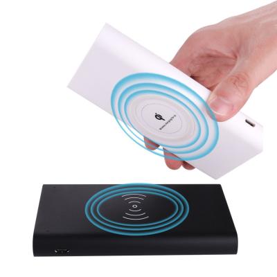 China New Mobile Wireless Charging Power 10000 mA Three-in-One Portable Wireless Charging Power Supply Power Bank for sale