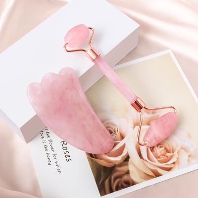 China Whitening Customized High Quality Natural Gemstone Rose Quartz Wings Shape Jade Roller Gua Sha Set for sale