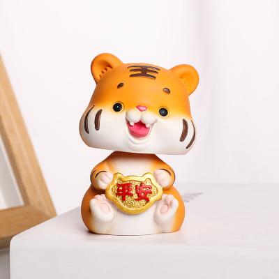 China Ornament cute heart tiger cute creative resin ornaments zodiac doll creative home decoration car ornaments shook her head doll tiger for sale