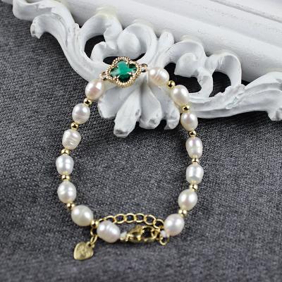 China Fashion CLASSIC Bracelet Natural Freshwater Pearl Bead With Four Leaf Clover Jewelry For Women for sale