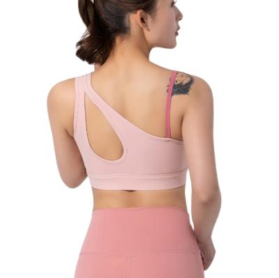 China Breathable High Quality Workout Fitness Women Gym Clothing Sports Yoga Back Cross Crop Top Running Top Tank for sale