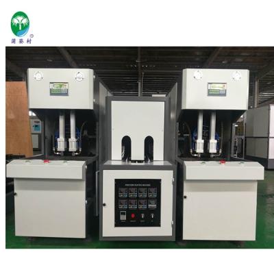 China Semi Automatic Bottle Blowing Plastic Bottle Making System PET Blowing Machine en venta