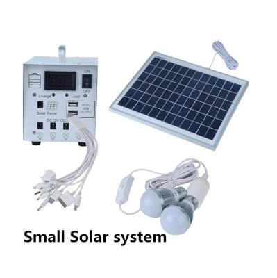 China Hot sale 8W/10W/20W home portable solar home lighting system with battery with led bulbs for home use for sale