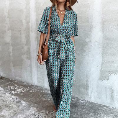 China Wholesale Fashion Casual Women QUICK DRY Plunging Neck All Over Print Belt Overalls for sale