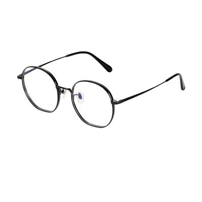 China Black Round Metal Unisex Unique Optical Glass Eye Frames Latest Titanium Eyeglasses For Women Men for sale