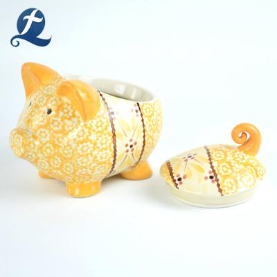 China Eco-friendly Gift Wholesale Cute Hand Piggy Bank Ceramic Pig Painting Piggy Bank for sale