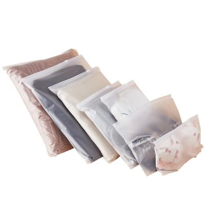 China Wholesale Custom Logo Frosted Sachet Strong Adhesive/Tearproof/Opaque/No Smell Plastic Clothes Zip Lock Self Seal Bag Clothing Packaging Frosted Zipper Bags the printed logo for sale