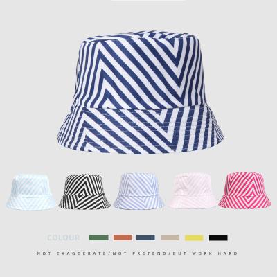 China Japanese zebra solid color simple fashion popular outdoor bucket hat women's sunshade fisherman hat men's striped reversible spring hat for sale