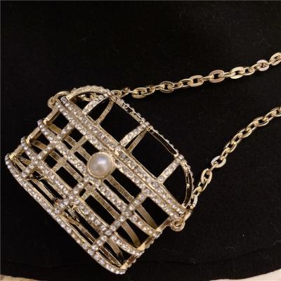 China Earphone cavity metal diamond-studded small square bag new fashion mini bag accessories hug portable shoulder bag for sale