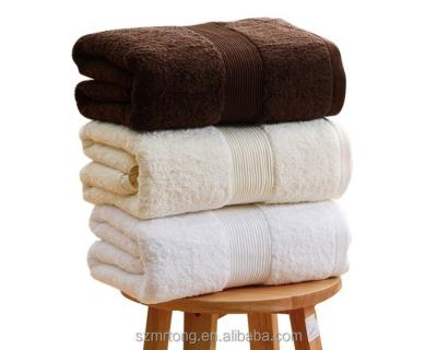 China Compressed White 100% Cotton Hotel Bath Towel Size 70*140CM 400GSM for sale