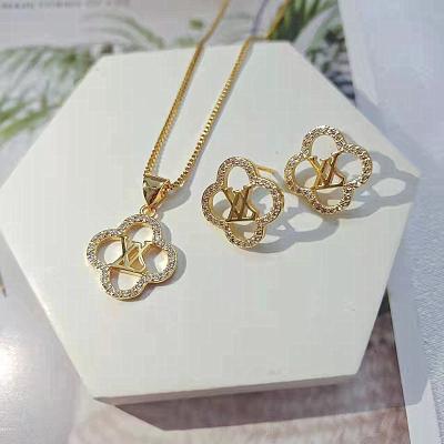 China Europe and America Custom Necklace High quality Fashion Personality Charm Necklace 18k Gold Plated Women's Clover Jewelry Set for sale