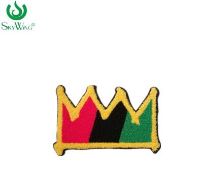 China Crown Chenille Personalised Embroidered Badges Stick On Hoodies for sale