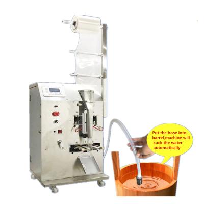 Cina Low Cost Automatic Ice Lolly Pop Sachet Filling Sealing Packing Machine per gelato Candy Popsicle Liquid Packaging Machine in vendita