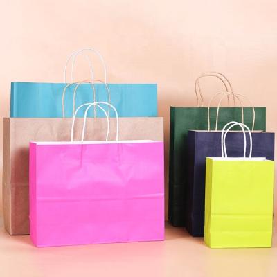 China Custom Printing Reusable Organic Brown Degradable Logo Shopping Paper Bag Handle Kraft Paper Packaging Bag for sale