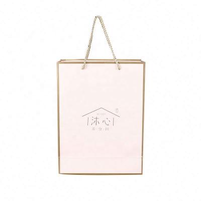 China Recyclable promotional black famous brand paper bag paper bag, wholesale paper shopping bag for clothing for sale