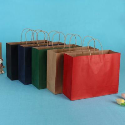 China Luxury Reusable Gift Paper Bag Twisted Paper Handle Logo Printing Bag Custom Kraft Paper Rope for sale