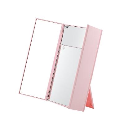 China Foldable Mirror Desk Triple Travel LED Mirror Lighted Makeup Mirror Vanity And Compact 8 Led Light Portable Mirror for sale