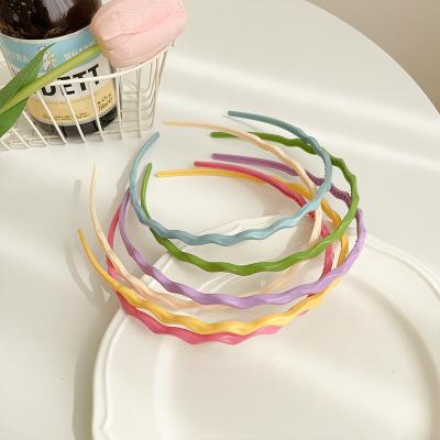 China Hair Bands Summer 2022 New Korean Candy Color Plastic Headband Waves Soft Party Baby Headband Children Cartoon Hair Accessories for sale