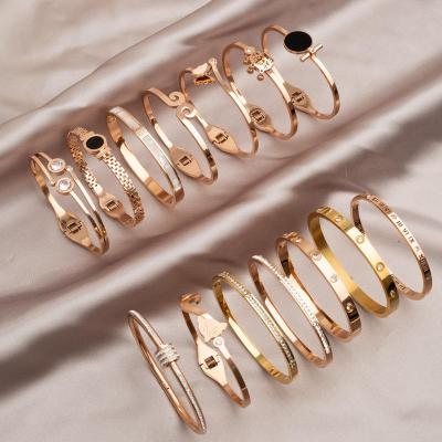 China Vintage Wholesale Classic New Designer Fashion Brand Jewelry Gold Plated Screw Bangles 316L Stainless Steel Nail Charm Open Bangle for sale