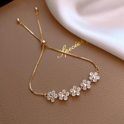 China Lefeng TRENDY Fashion Elegant Tasty Stainless Steel Gold Plated Jewelry Flower Zircon Women Adjustable Bracelet for sale