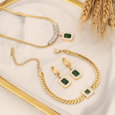 China FASHIONABLE Waterproof Gold Plated Cuban Emerald Crystal Women Jewelry Sets Pendant Necklace Earrings Stainless Steel Sweater Chain Bracelet for sale