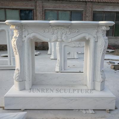 China Factory price European white marble stone french style fireplace mantel with flowers for decoration for sale