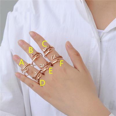 China Romantic Ring Hollow Stainless Steel Open End Cut Out Name Letter Fashion Ring Birthday Gift for sale