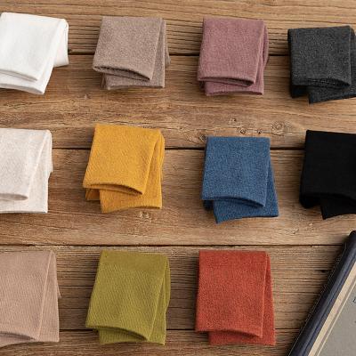 China 15000 square meters in various autumn and winter cotton men women children stock cheap solid color low long breathable short socks for sale