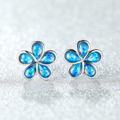 China Environmental friendly gold plated real gold plumeria studs synthetic fire opal plumeria flower stud earrings women for sale