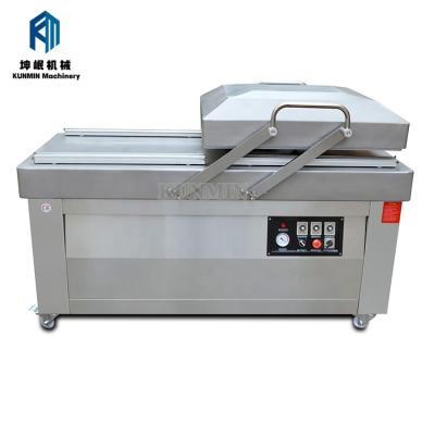 China Multifunctional Stainless Steel Food Continuous Belt Food Commercial Vacuum Packing Machine for sale