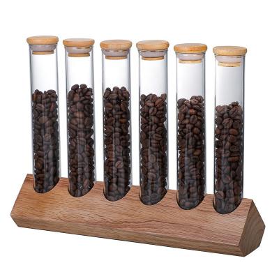 China Freshness Preservation Storage Tank Tea Coffee Sugar Glass Canisters Seasoning Jar Display Rack for sale