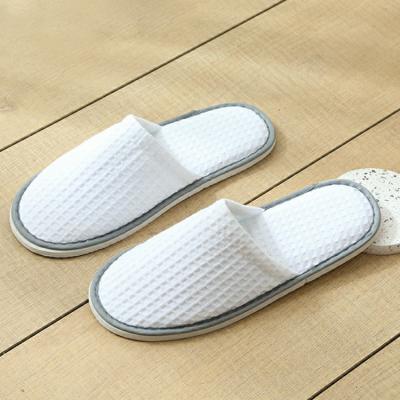 China Super soft and comfortable hotel slippers waffle price supplier cotton disposable hotel slippers for sale