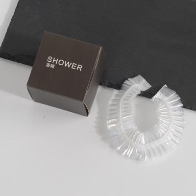 China Factory stocked wholesale hotel shower cap pe disposable white shower caps for sale