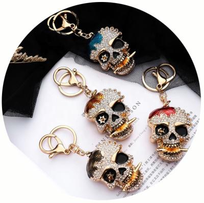 China Creative Fashional Souvenir Gifts Metal Keychain Charm Crystal Skull Head Fashion Jewelry Car Bag Pendant Key Chain For Men for sale