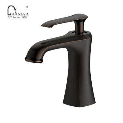 China UPC Contemporary American Pillar Basin Faucet Set Luxury Magnetic Water Saver UK Bronze Smart Faucet for sale