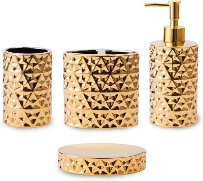 China Sustainable Gold Bathroom Accessory Set 4 Piece Ceramic Bath Accessories Sets Complete , Rain Essential Drop Shaped Bathroom With Toothbrush for sale