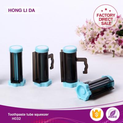 China Viable Wholesale Plastic Toothpaste Dispenser Squeeze Tube Squeezer for sale