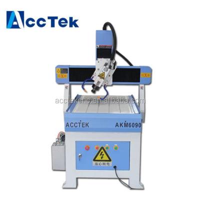 China 3d hotels cnc router with 4th aixs cnc router table 4 rotary axis for sale